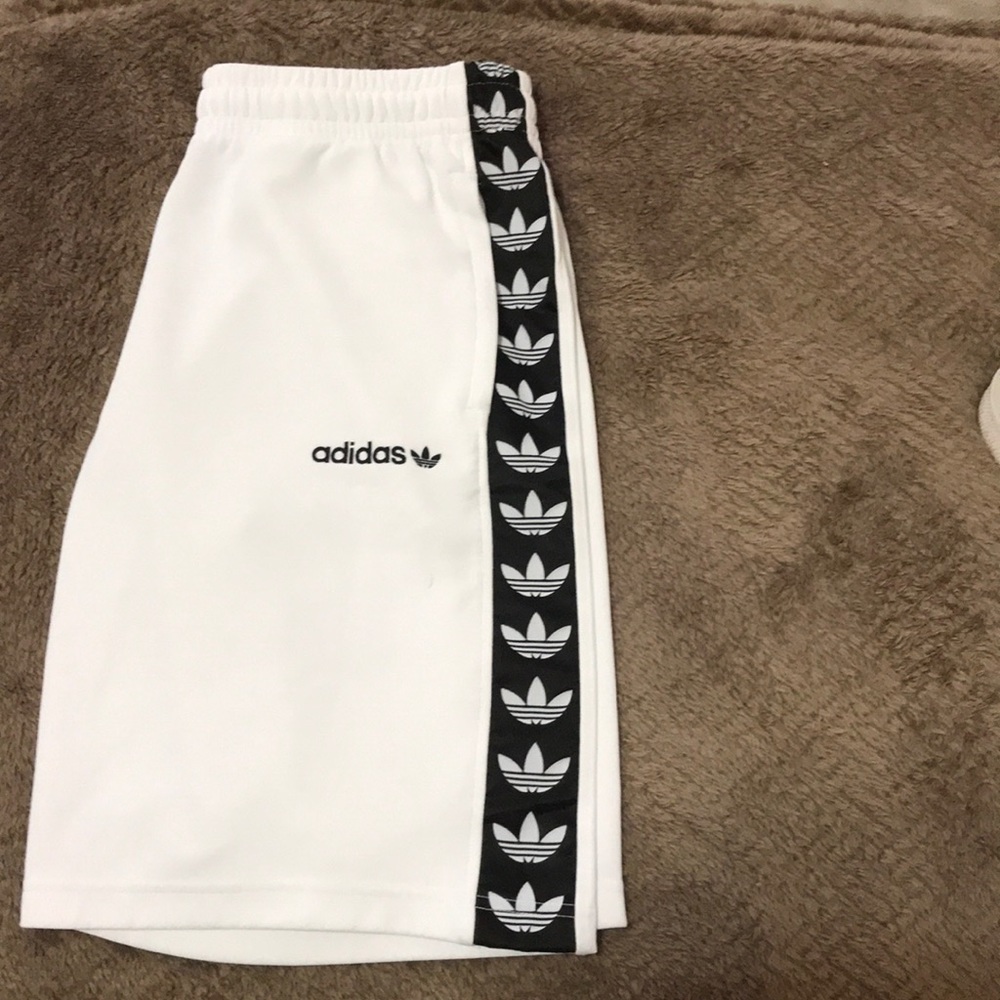 Adidas shorts w/ zipper pockets.